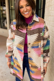 Southwestern print shirt jacket in beige with button front and collar.