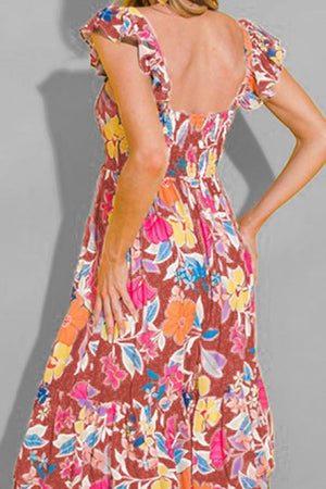 Floral ruffle-sleeve tiered midi dress with a smocked bodice and vibrant floral print.