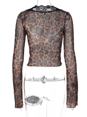 Leopard print sheer long sleeve t-shirt with black lace trim neckline.