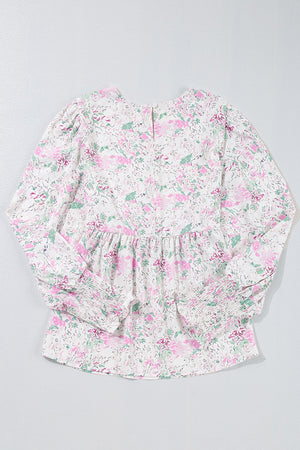 Blush pink floral print blouse with smocked waist and cuffs