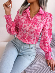 Deep Rose floral print shirred cuff blouse with button front and collar.