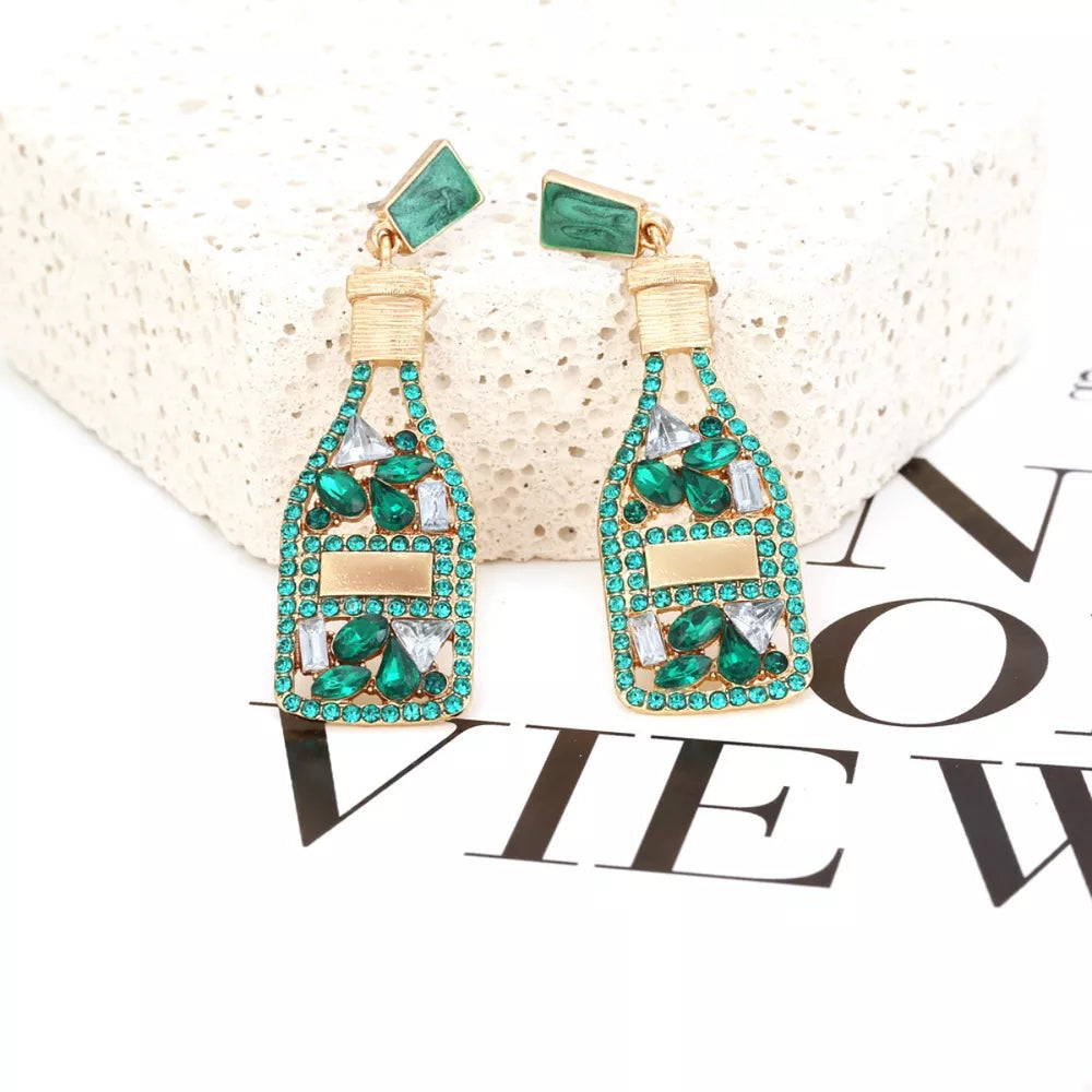 Green champagne bottle drop earrings with gold accents and clear crystals.