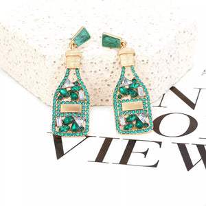 Green champagne bottle drop earrings with gold accents and clear crystals.