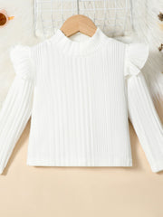 White ribbed knit top with ruffled shoulders and mock neck.