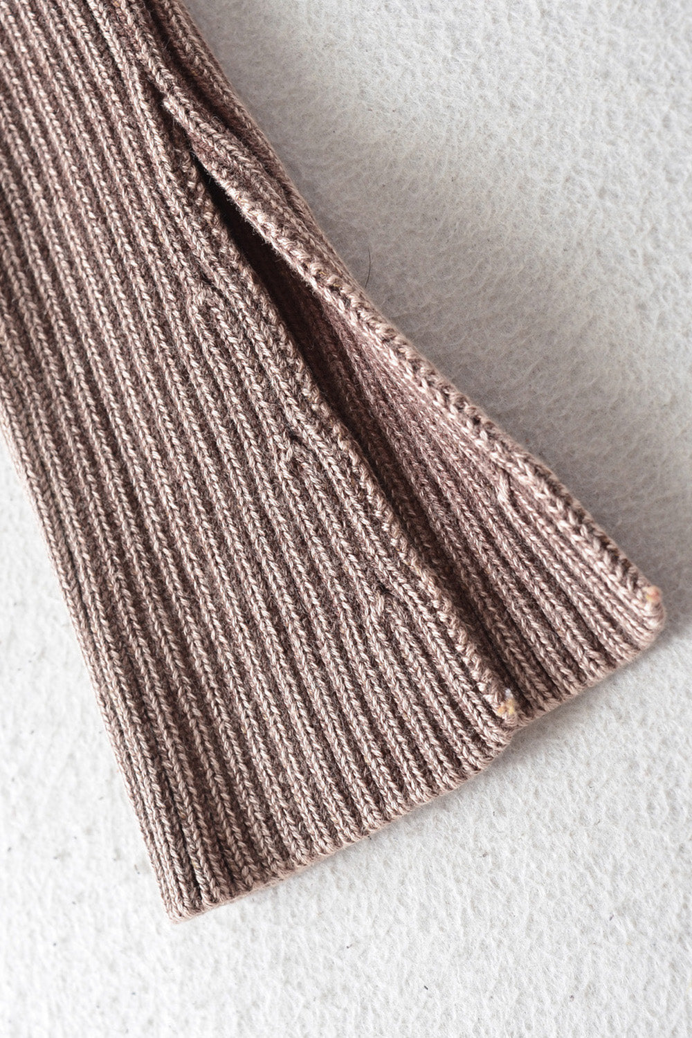 Ribbed taupe off-shoulder top with flare sleeves and side slit detail