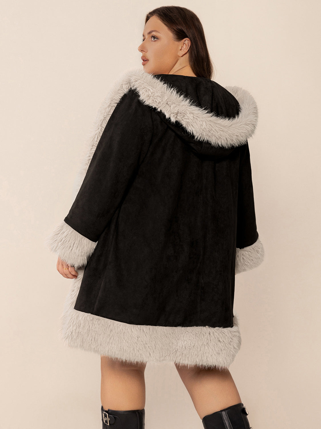Black hooded duster coat with faux shearling trim on hood, cuffs, and hem