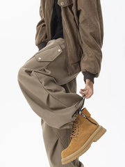 Khaki cargo sweatpants with snap-button pockets and adjustable drawstring cuffs.
