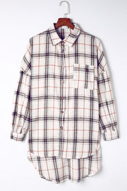 Oversized white plaid shacket with button front and chest pocket.