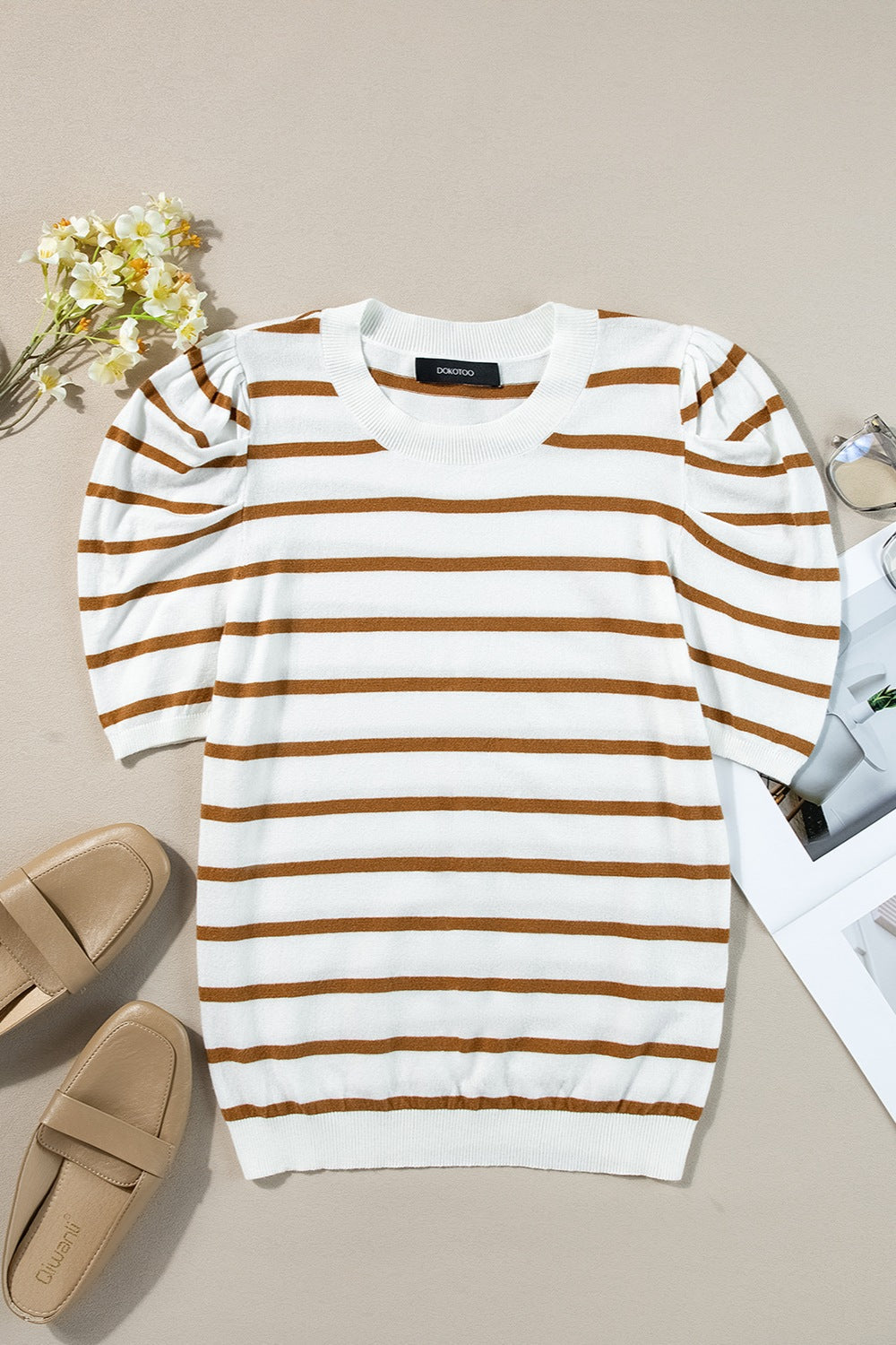 Puff sleeve breton knit top in white with brown stripes and a crew neck.