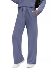 Dusty blue casual long-sleeve top and drawstring pants set with pockets.