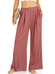 Pleated palazzo trousers in burnt coral with pockets and a wide leg