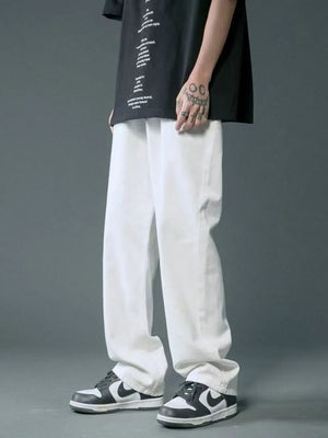 Casual oversized white men's jeans with pockets and a relaxed fit.