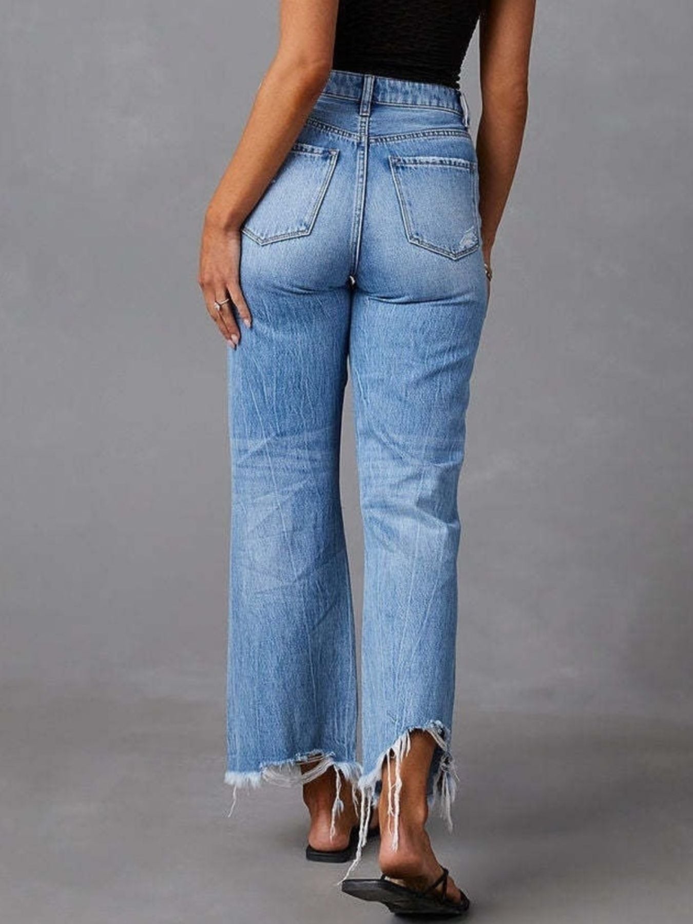 Chic distressed blue denim maternity flare jeans with raw hem