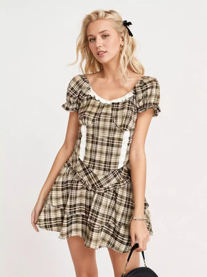 Plaid puff sleeve two-piece set with lace trim and ruffled skirt.