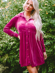 Deep Rose velvet babydoll button-down mini dress with a collared neckline and long sleeves.