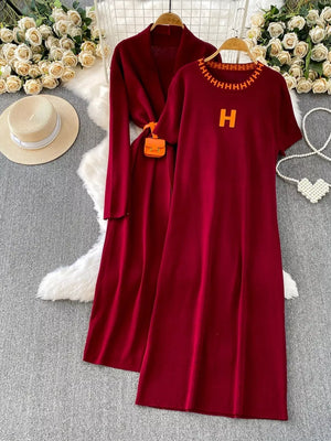 Burgundy knitted maxi dress with H detail and matching cardigan ensemble.