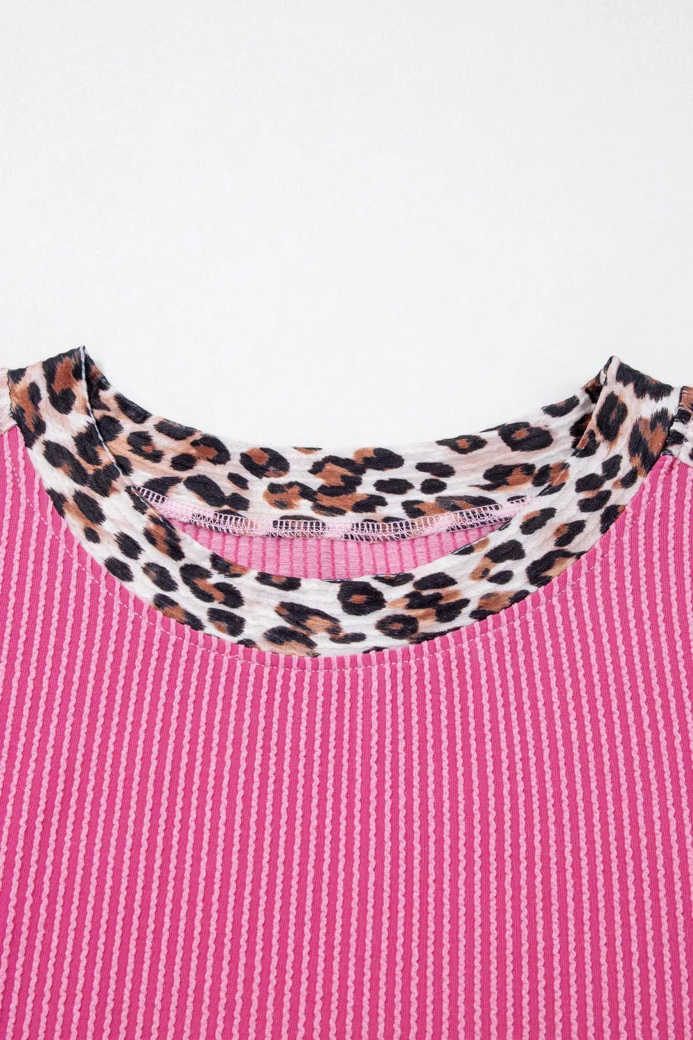 Pink ribbed crew neck pajama top with leopard print trim
