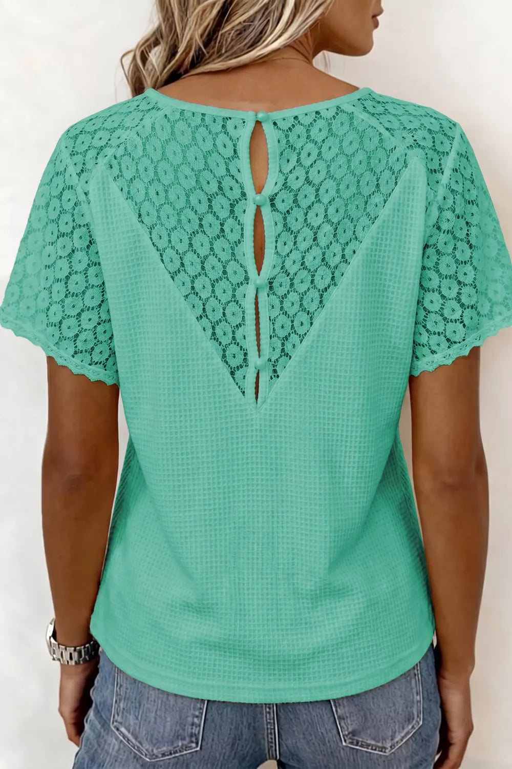Green waffle knit shirt with lace back detail and button closure