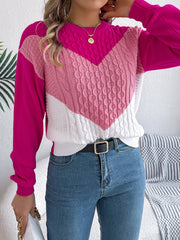 Chevron cable knit sweater with contrast pink, white, and hot pink colorblock pattern.