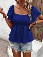 Blue smocked blouse with square neck and ruffled short sleeves, textured polyester