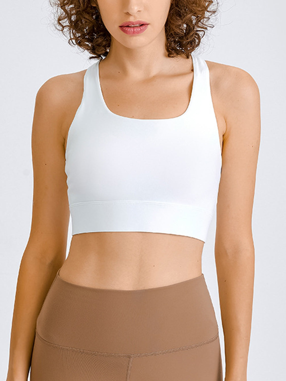 White sculpted racerback crop top with a square neckline and wide band.