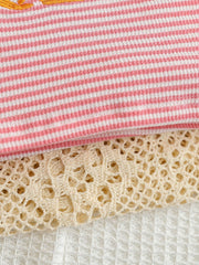 Baby set with pink and white stripes, crochet trim, and waffle knit fabric.