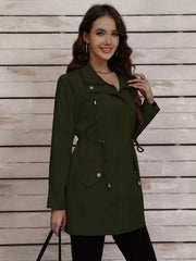 Military green drawstring trench coat with snap-down detail and cinched waist
