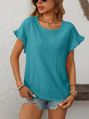 Teal eyelet knit blouse with ruffled short sleeves and a scoop neckline.