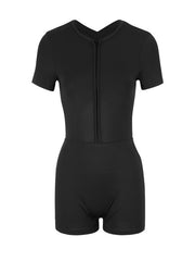 Black short-sleeve romper with front zipper and cutout back detail.