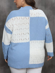 Light blue and white geometric openwork patchwork knit sweater with long sleeves.