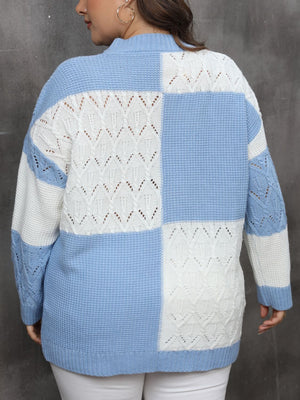 Light blue and white geometric openwork patchwork knit sweater with long sleeves.