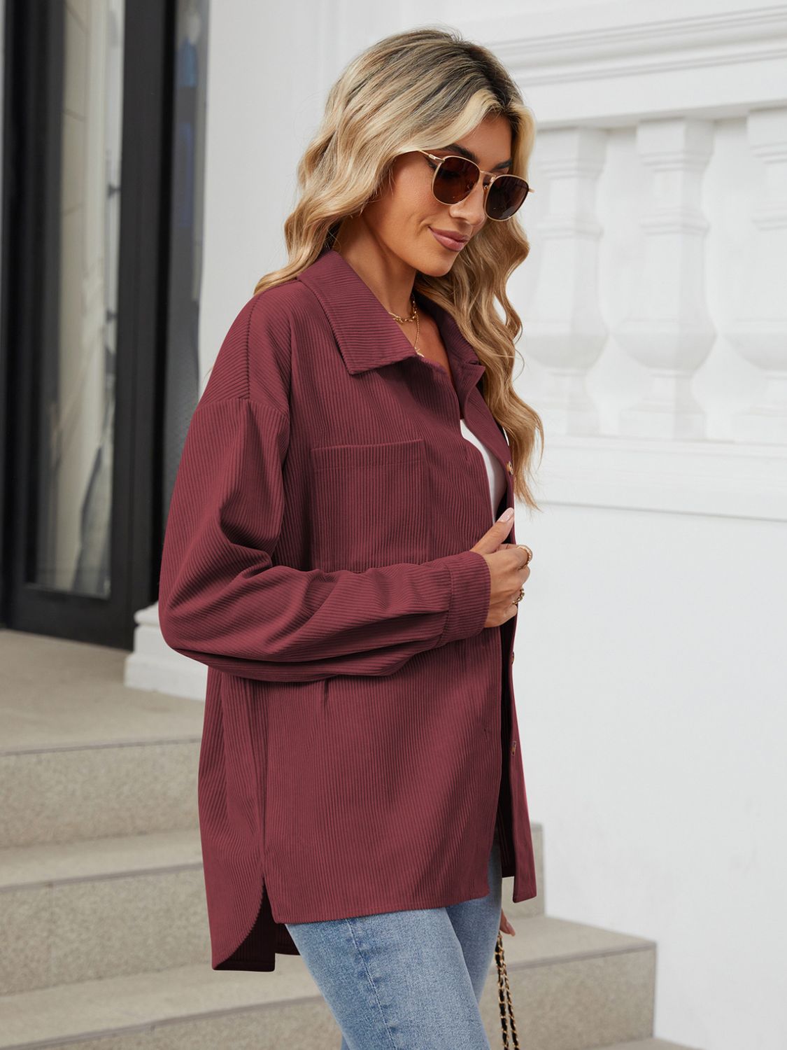 Burgundy corduroy overshirt with button front and chest pocket, relaxed fit.