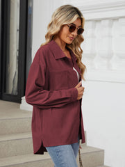 Burgundy corduroy overshirt with button front and chest pocket, relaxed fit.