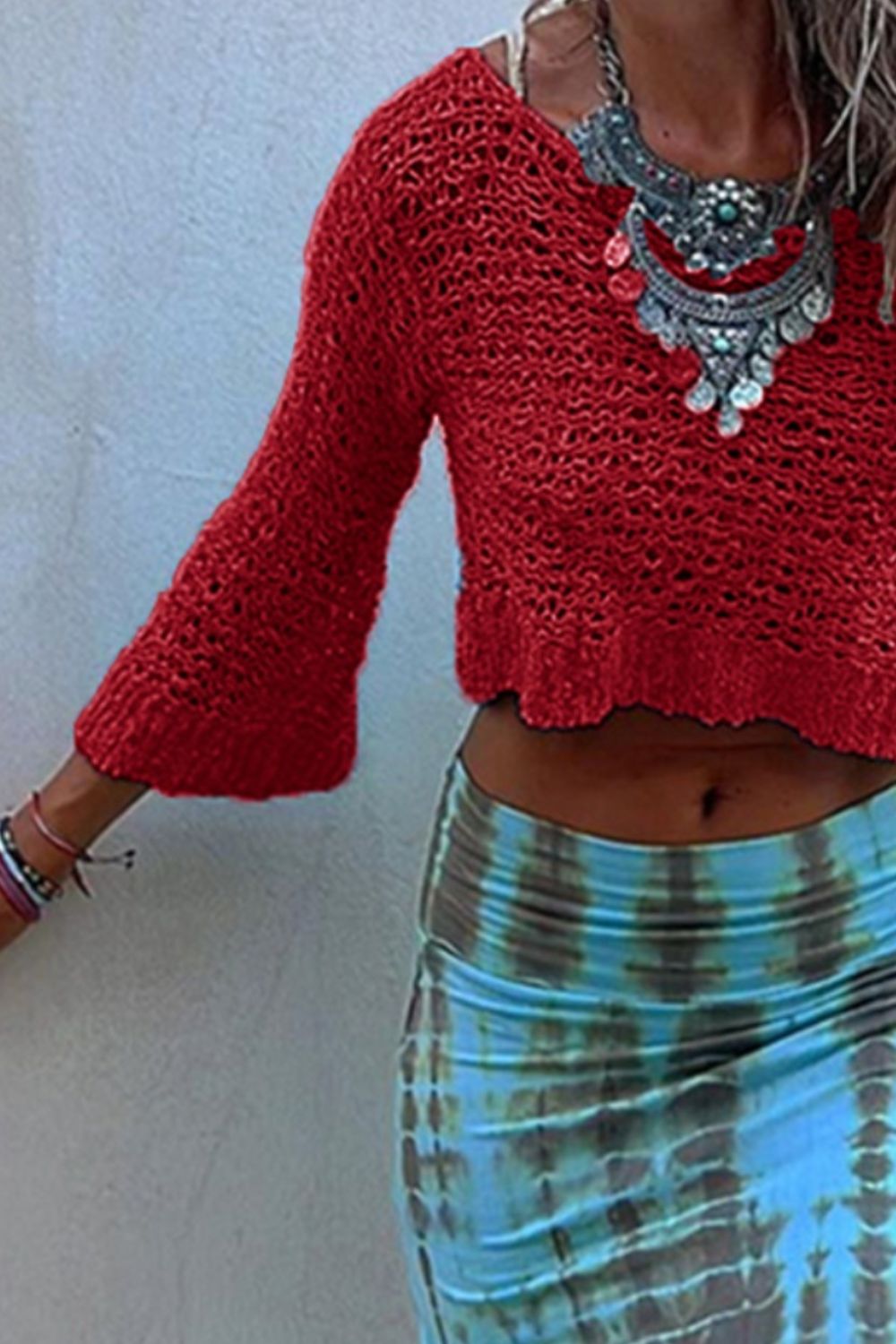 Deep Red crochet crop top with bell sleeves and open knit detail.