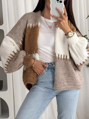 Open front cardigan with balloon sleeves in brown, white, and beige colorblock knit.