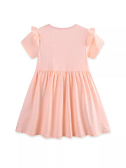 Pink cotton toddler dress with white polka dots, ruffled sleeves, and a gathered A-line skirt.