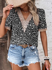 Black floral blouse with lace trim V-neck and short sleeves