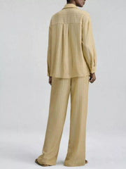 Chic striped two-piece set with button-down shirt and wide-leg pants in tan.