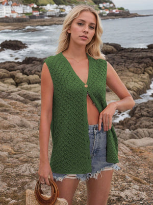 Openwork button-down knit vest in dark green with a V-neck and diamond pattern.