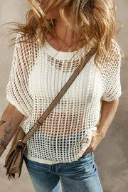 White open-knit slouchy shoulder cover-up with short sleeves and a relaxed fit.