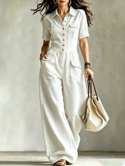 Denim Wide-leg Jumpsuit With Chest Pockets in Black, back view