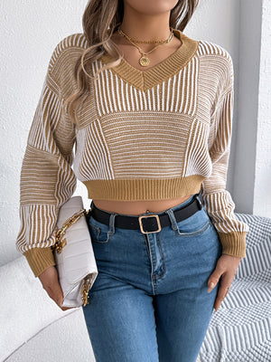 Geometric stripe cropped knit sweater with V-neck in tan and white acrylic.