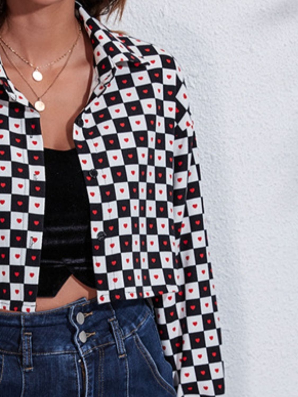 Checkerboard cropped shirt jacket with red hearts, button front, and collar.