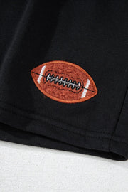 Black cotton sweatshirt with embroidered football detail.