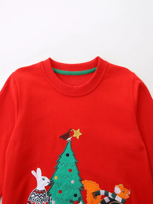 Red cotton crewneck sweatshirt with embroidered holiday scene of a Christmas tree, rabbit, squirrel, and bird.