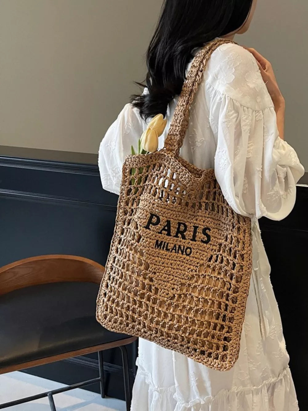 Khaki crochet tote bag with "PARIS MILANO" text and woven straps.