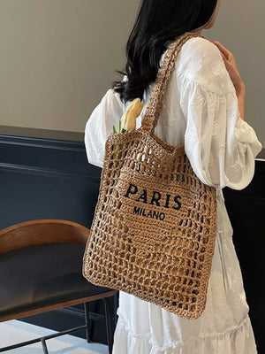 Khaki crochet tote bag with "PARIS MILANO" text and woven straps.