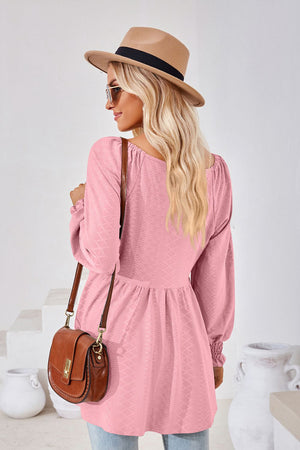 Textured babydoll blouse in Dusty Pink with smocked cuffs and a square neckline.