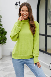 Textured turtleneck sweater in lime green with long sleeves and a relaxed fit.