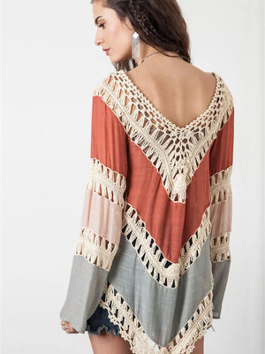Crochet-trimmed long sleeve cardigan in colorblock with cutout details.